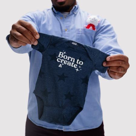 Onesie: “Born to create”